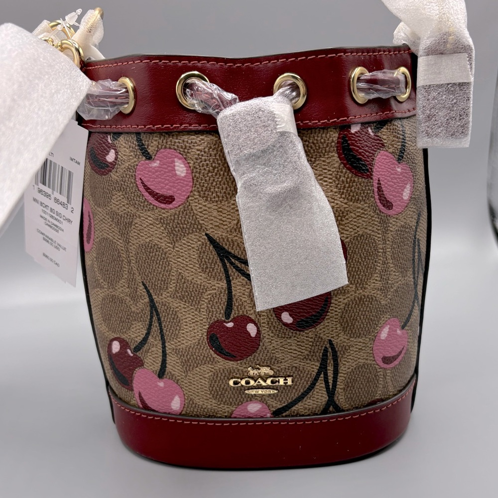 **SOLD**Coach Cherry mini Bucket bag and Heart coin case